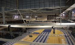 Electric chain hoists carry truss in stadium