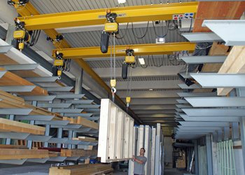 Transporting window frames with GIS overhead travelling cranes