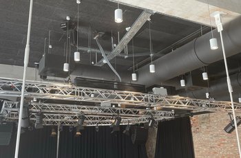 GIS motors hold a stage system for light installations and theatre curtains