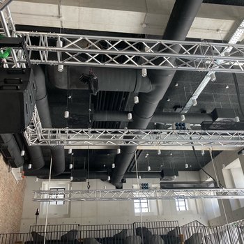 GIS motors hold a truss with loudspeaker