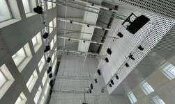 In the large room, the stage systems are raised and lowered by chain hoists