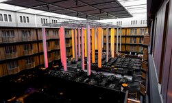 electric chain hoists LP D8+ light elements Chain motor holds lighting elements above people in hotel lobby
