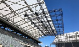 D8Plus chain hoists in football stadium chain motors hold scaffolding with loudspeaker system
