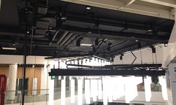 Chain hoists hold steel construction with lamp system