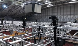 GIS Electric chain hoists carry truss in stadium